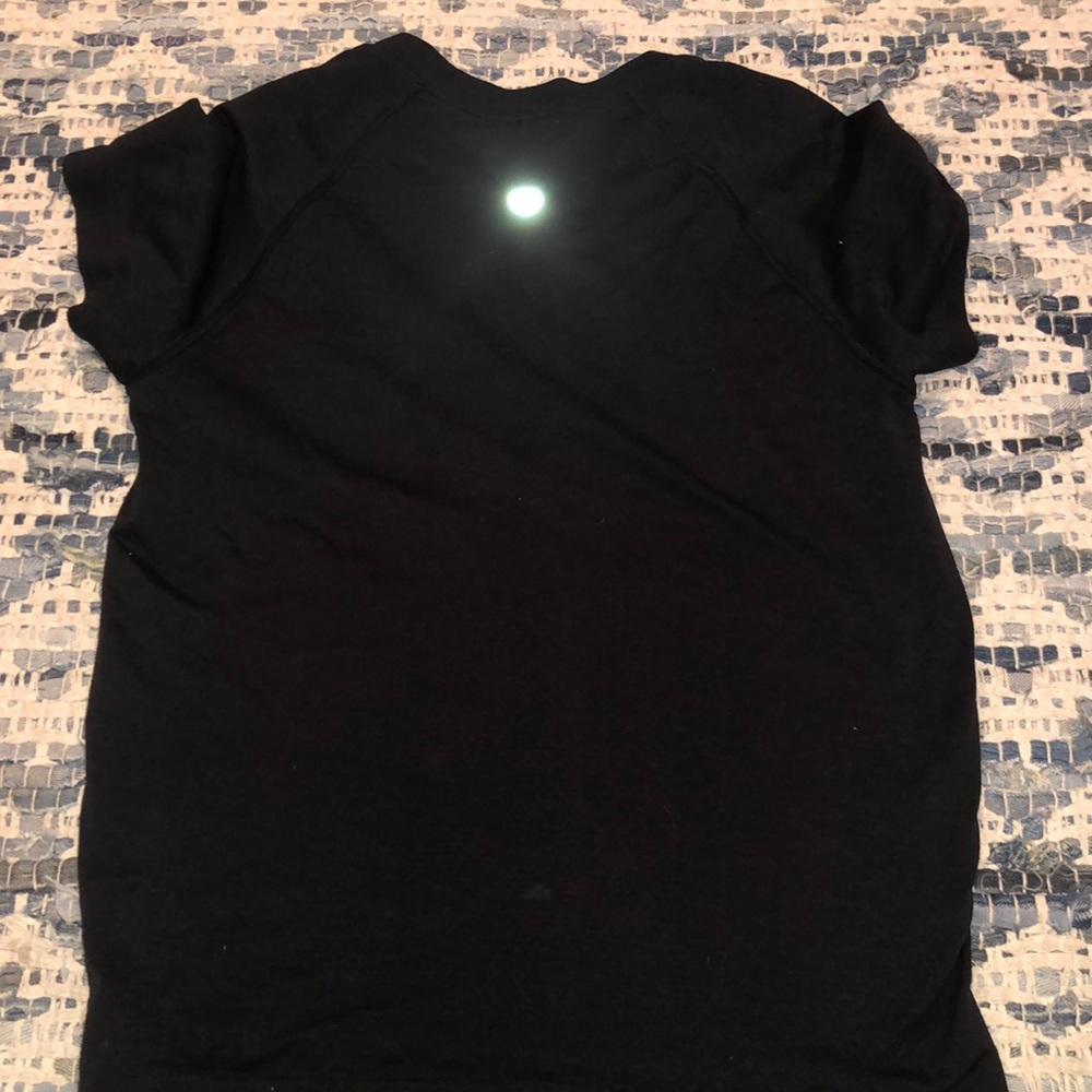 Lululemon Black top size 4 slightly used